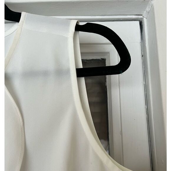 Chico’s white sleeveless v-neck blouse, jabot in front, slits at sides, size 0. - Picture 3 of 7